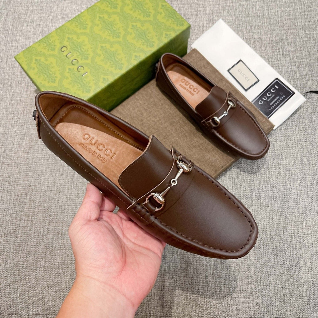Gucci Brown Bit Loafers — model