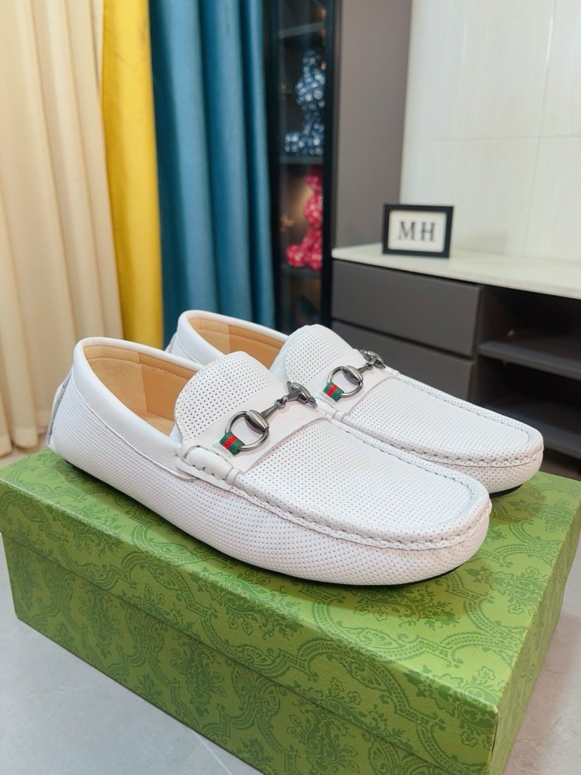Gucci Perforated Metal Hardware Loafers — front